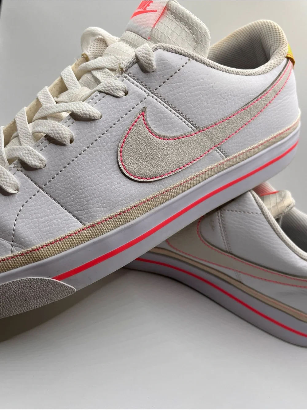 Nike Women’s White Low-Top Sneakers with Pink and Yellow Accents 12